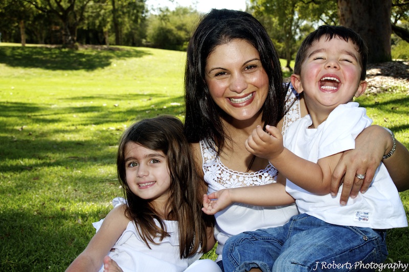 Mother and 2 children laughing - family portrait photography